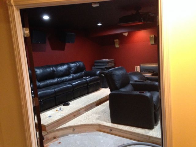 Custom seat platform risers with berkline home theater seats and